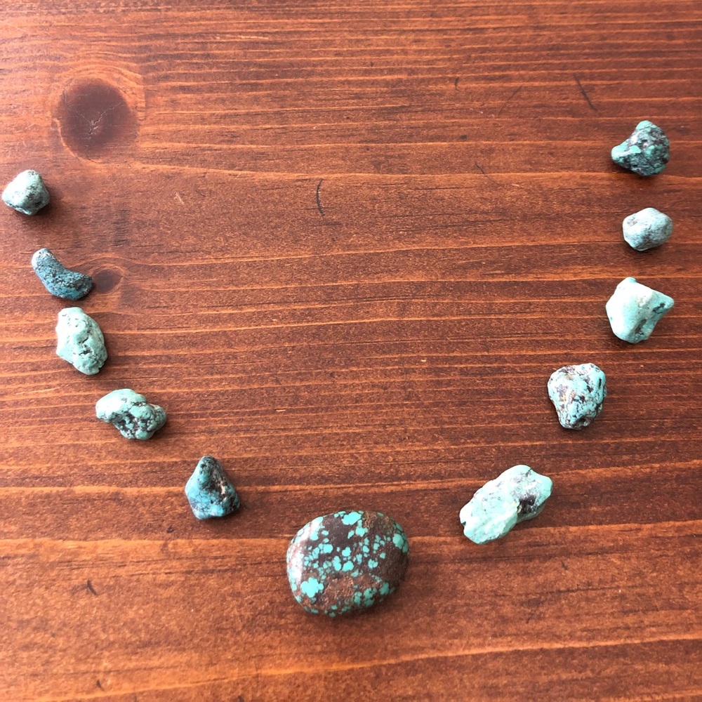 Turquoise rock pieces ready for jewelry design